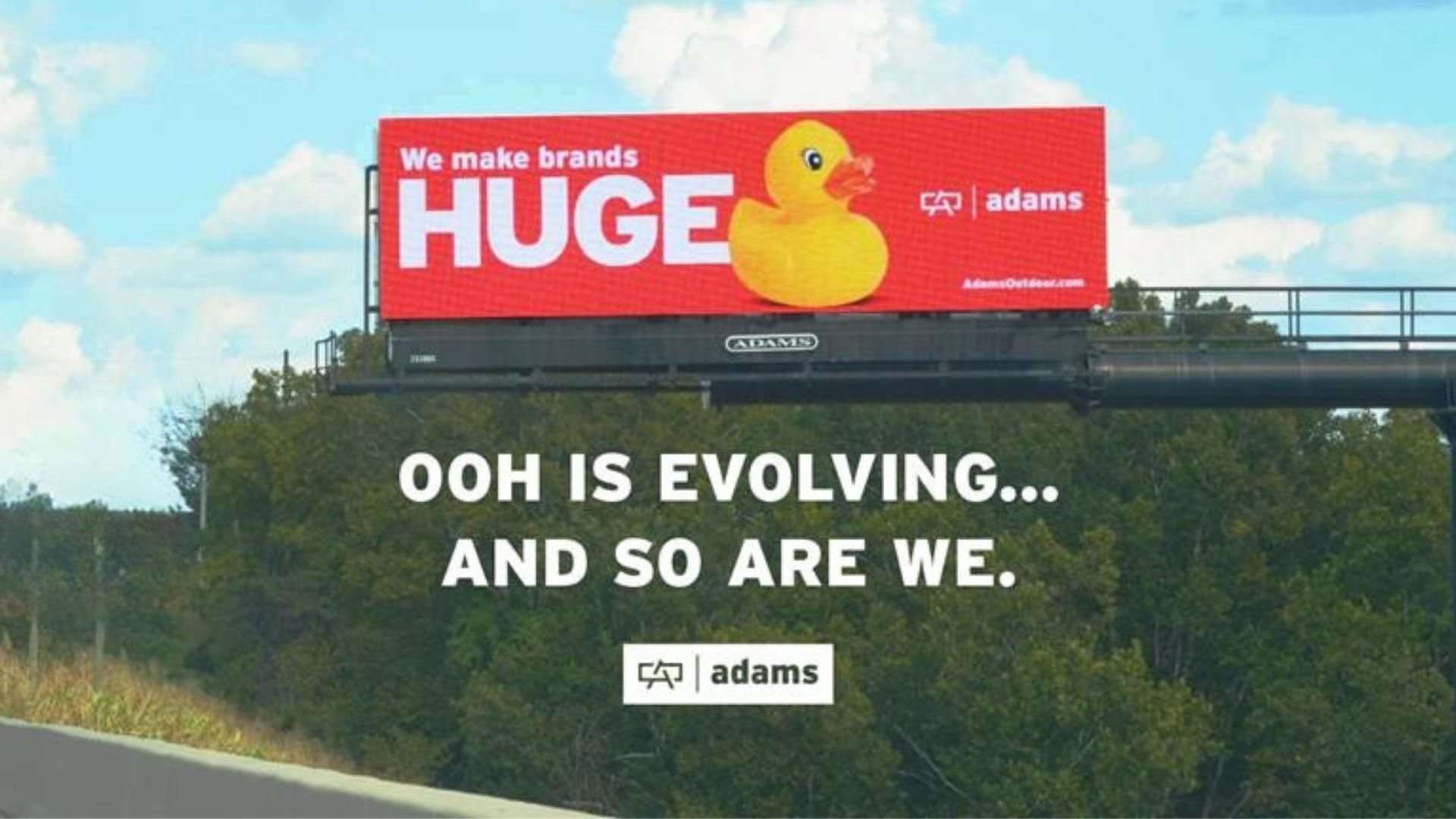 Adams Outdoor Advertising billboard campaign highlighting the evolution of out-of-home advertising