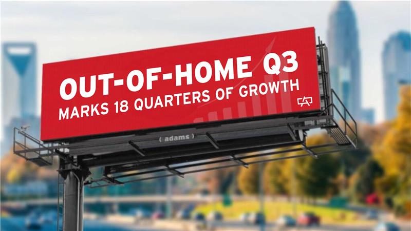 Out-of-home advertising billboard reading “Q3 marks 18 quarters of growth,” highlighting continued OOH industry growth in an urban market.