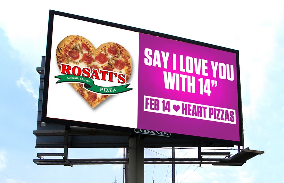 Valentine’s Day billboard advertising campaign in Champaign-Urbana, Illinois promoting seasonal out-of-home advertising.