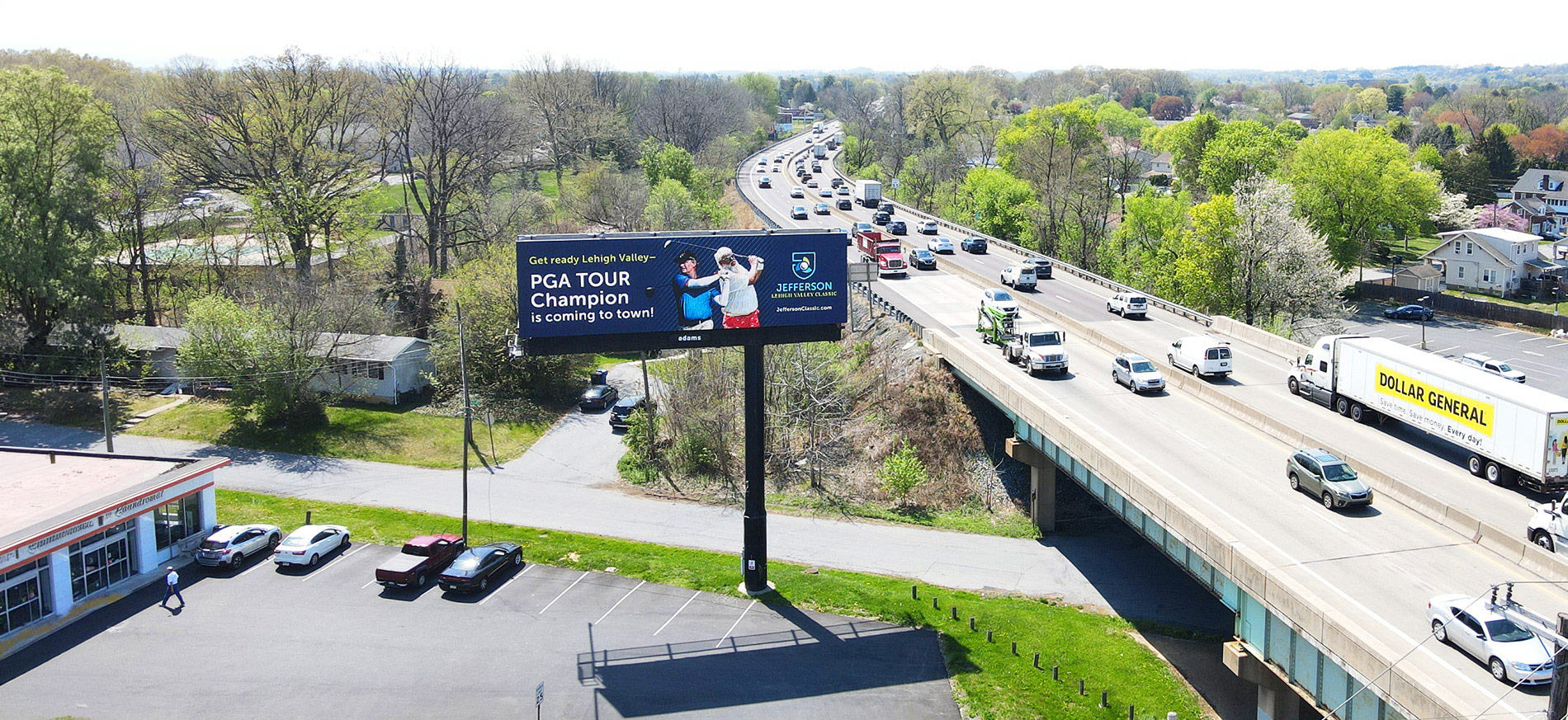 Billboard CPM Calculator golfing billboard alongside roadway