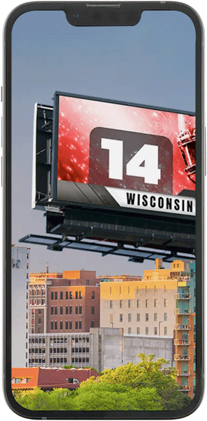 Large iPhone showing a programmatic billboard on its screen.